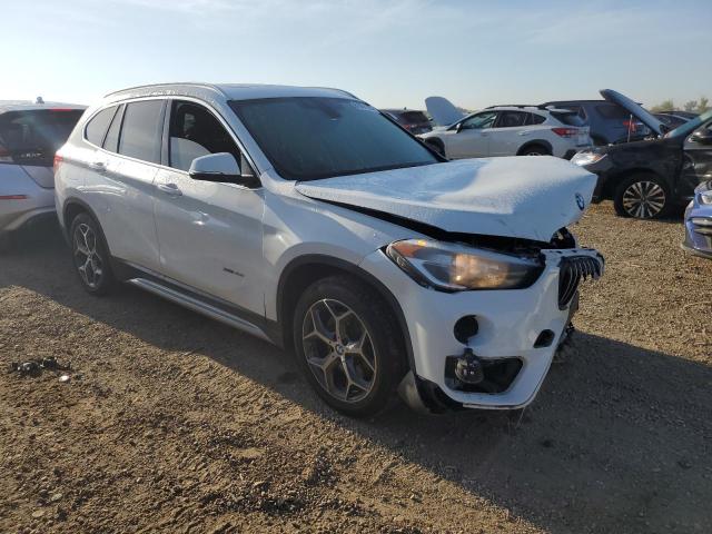 WBXHT3C32GP889423 - 2016 BMW X1 XDRIVE28I WHITE photo 4