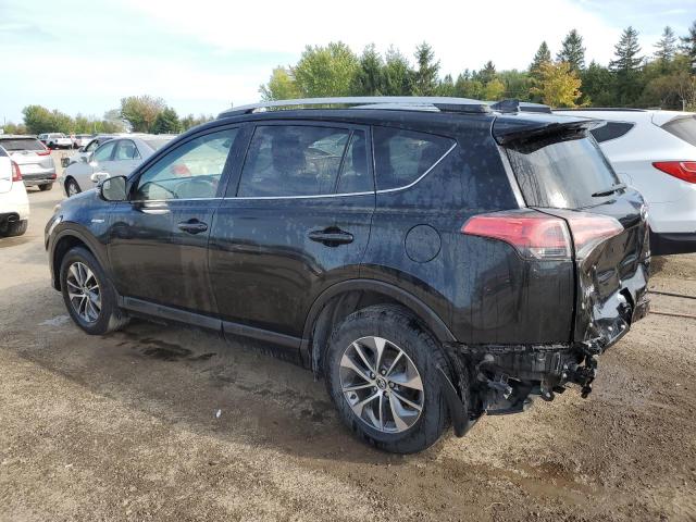 JTMRJREVXJD231513 - 2018 TOYOTA RAV4 HV LE Negro foto 2