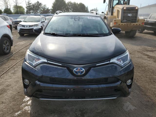 JTMRJREVXJD231513 - 2018 TOYOTA RAV4 HV LE Negro foto 5