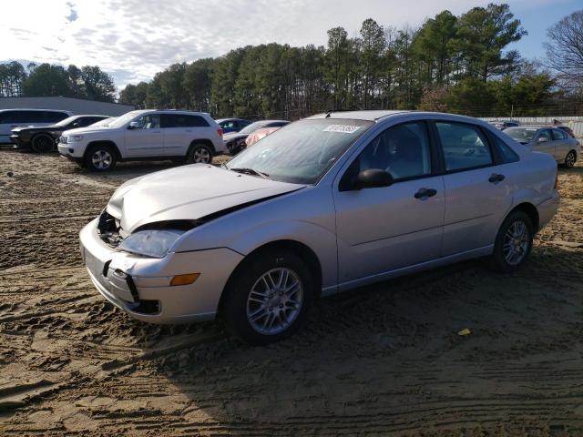 1FAFP34NX6W210680 - 2006 FORD FOCUS ZX4 SILVER photo 1