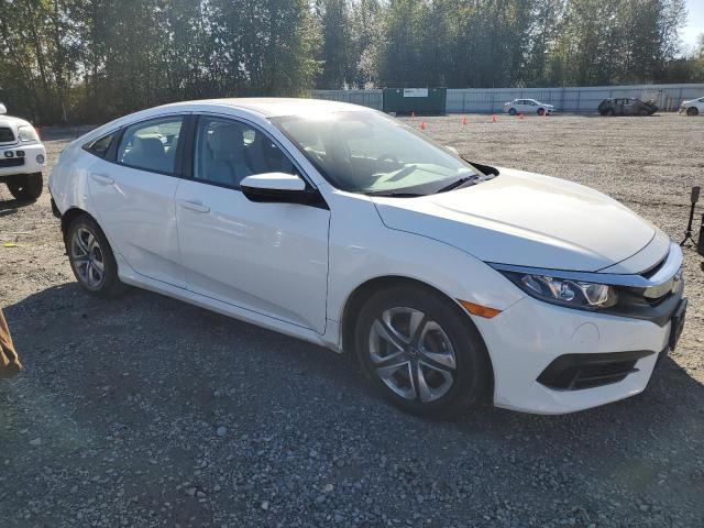 2HGFC2F57JH532313 - 2018 HONDA CIVIC LX WHITE photo 4