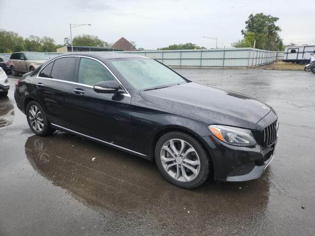 55SWF4KB1FU014125 - 2015 MERCEDES-BENZ C 300 4MATIC BLACK photo 4