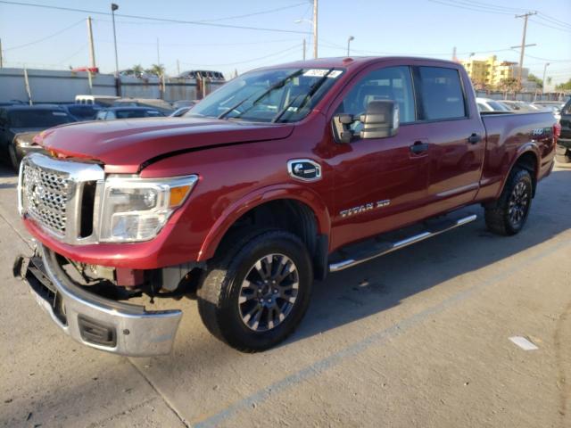 1N6BA1F46GN516606 - 2016 NISSAN TITAN XD SL RED photo 1