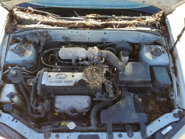 KMHCG45C94U499832 - 2004 HYUNDAI ACCENT GL SILVER photo 11