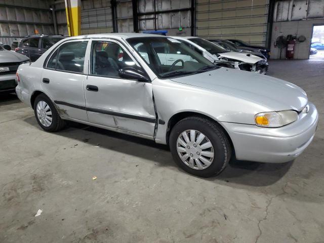 1Y1SK5483YZ410164 - 2000 CHEVROLET GEO PRIZM BASE SILVER photo 4