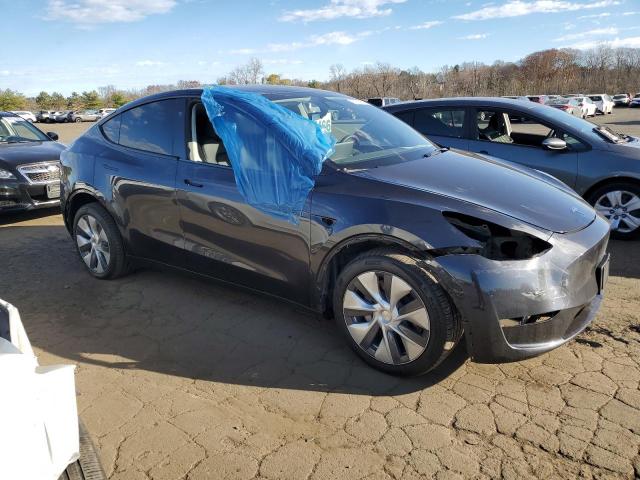 7SAYGDEE2RA232477 - 2024 TESLA MODEL Y BLACK photo 4