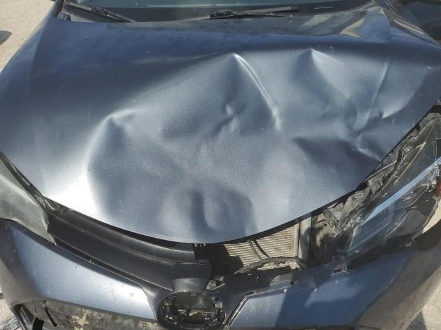 5YFBURHEXHP730873 - 2017 TOYOTA COROLLA L BLUE photo 11