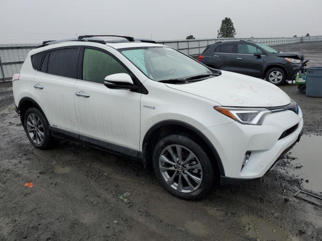 JTMDJREV4JD221750 - 2018 TOYOTA RAV4 HV LIMITED WHITE photo 4