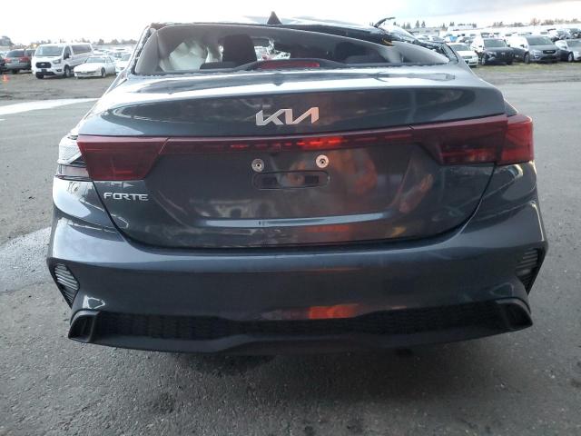 3KPF24AD9PE634437 - 2023 KIA FORTE LX GRAY photo 6