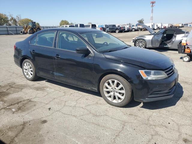 3VWD17AJ4FM316695 - 2015 VOLKSWAGEN JETTA SE BLACK photo 4