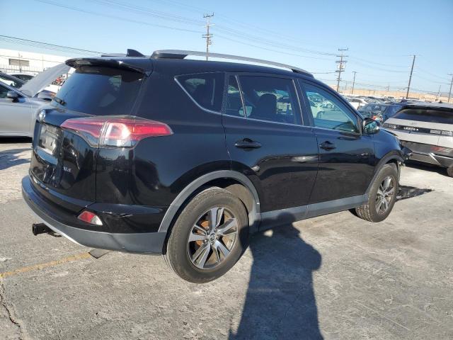 2T3WFREV3GW309128 - 2016 TOYOTA RAV4 XLE 黑色 照片 3