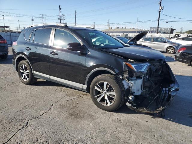 2T3WFREV3GW309128 - 2016 TOYOTA RAV4 XLE 黑色 照片 4