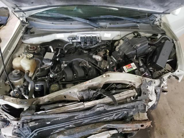 4F2CZ04105KM00996 - 2005 MAZDA TRIBUTE S TAN photo 12