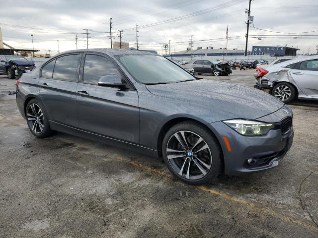 WBA8B9G54JNU97381 - 2018 BMW 330 I GRAY photo 4