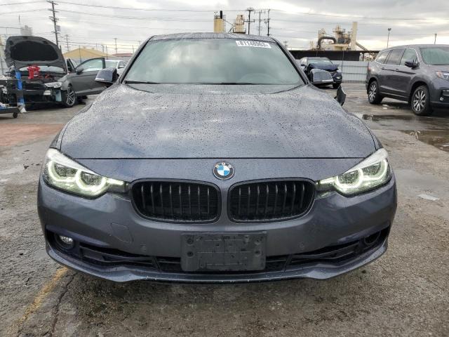 WBA8B9G54JNU97381 - 2018 BMW 330 I GRAY photo 5