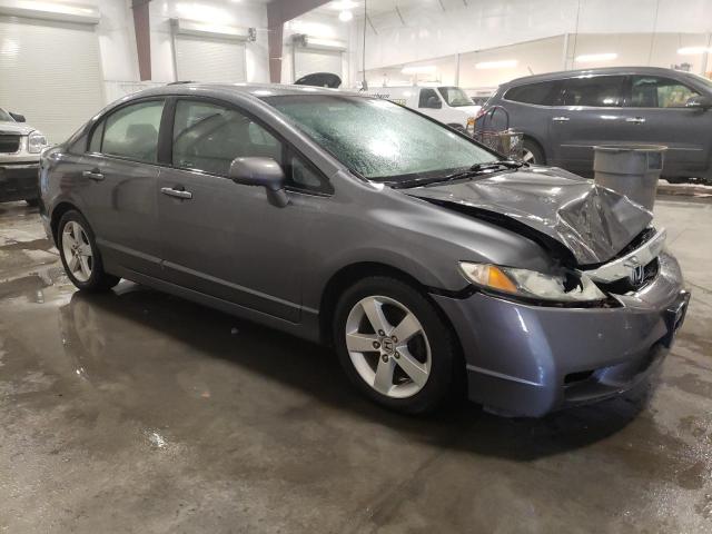 19XFA1F61AE000946 - 2010 HONDA CIVIC LX-S فحمي صورة 4