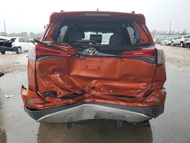 JTMNFREV2GD089313 - 2016 TOYOTA RAV4 SE ნარინჯისფერი ფოტო 6