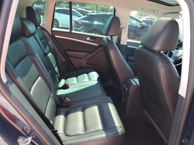 WVGAV7AX3DW549233 - 2013 VOLKSWAGEN TIGUAN S ლურჯი ფოტო 10