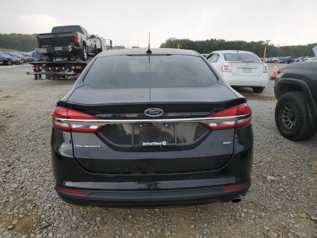 3FA6P0H78JR285948 - 2018 FORD FUSION SE Schwarz Foto 6