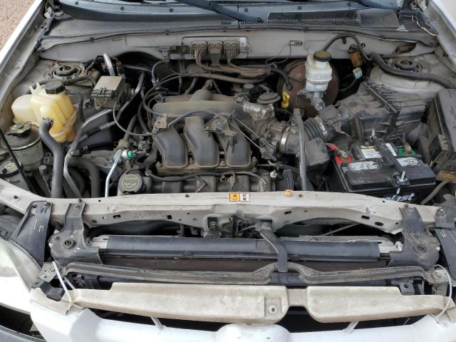 4F2YZ06115KM32407 - 2005 MAZDA TRIBUTE S WHITE photo 12