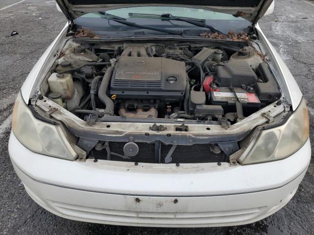 4T1BF28B4YU110087 - 2000 TOYOTA AVALON XL CREAM photo 11