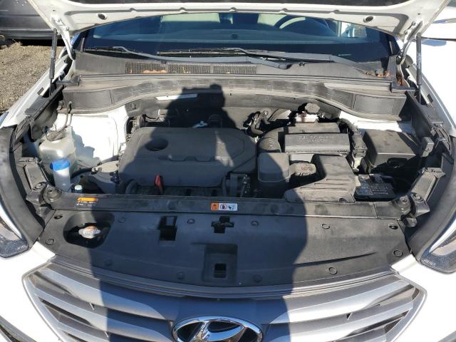 5NMZU3LB4HH034738 - 2017 HYUNDAI SANTA FE S WHITE photo 11