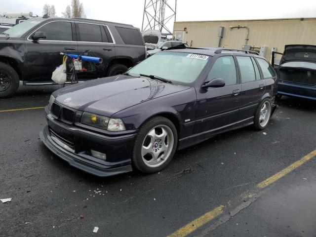 WBACE510X0EN67309 - 1997 BMW 320 PURPLE photo 1