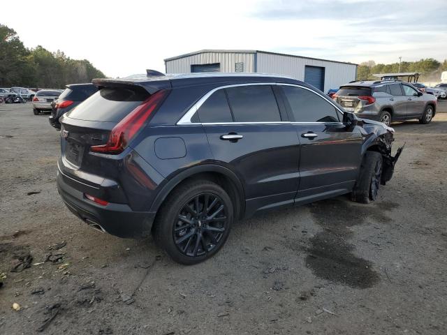 1GYAZAR47PF106923 - 2023 CADILLAC XT4 LUXURY BLACK photo 3