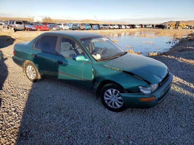 1NXBB02E7VZ534619 - 1997 TOYOTA COROLLA DX TEAL photo 4