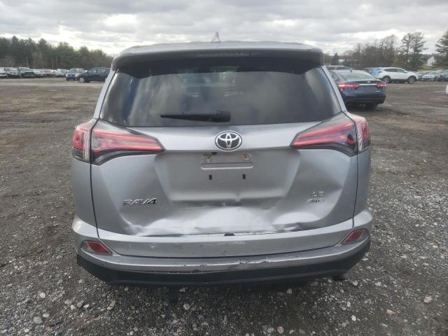 JTMBFREV3JJ208689 - 2018 TOYOTA RAV4 LE SILVER photo 6