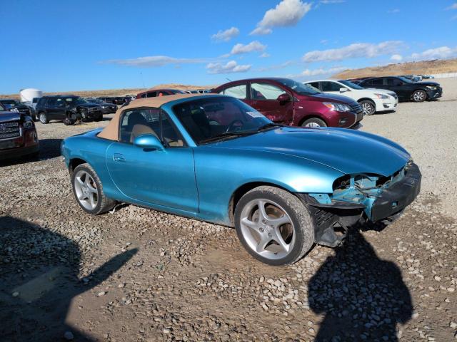 JM1NB353110202528 - 2001 MAZDA MX-5 MIATA BASE TEAL photo 4