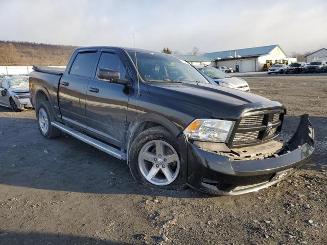 1D7RV1CT1BS589030 - 2011 DODGE RAM 1500 BLACK photo 4