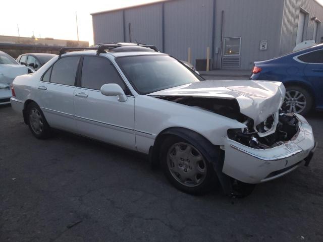 JH4KA9669XC006327 - 1999 ACURA 3.5RL WHITE photo 4