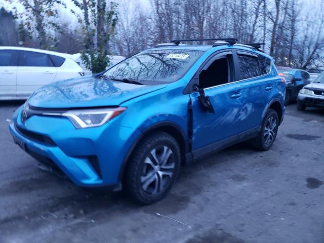 2T3ZFREV1JW502883 - 2018 TOYOTA RAV4 LE BLUE photo 1