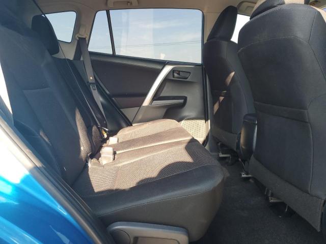 JTMZFREV1JJ736407 - 2018 TOYOTA RAV4 LE Bleu photo 11