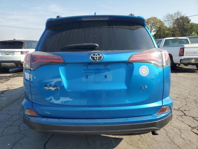 JTMZFREV1JJ736407 - 2018 TOYOTA RAV4 LE Bleu photo 6