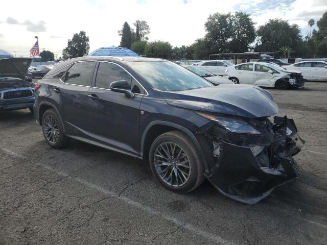 2T2BZMCAXJC159508 - 2018 LEXUS RX 350 BASE BLACK photo 4
