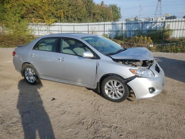2T1BU40E29C142451 - 2009 TOYOTA COROLLA BASE Silber Foto 4