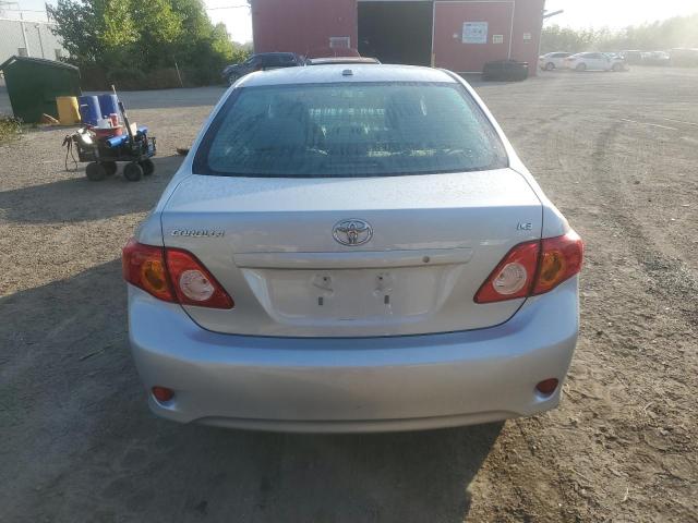 2T1BU40E29C142451 - 2009 TOYOTA COROLLA BASE Silber Foto 6