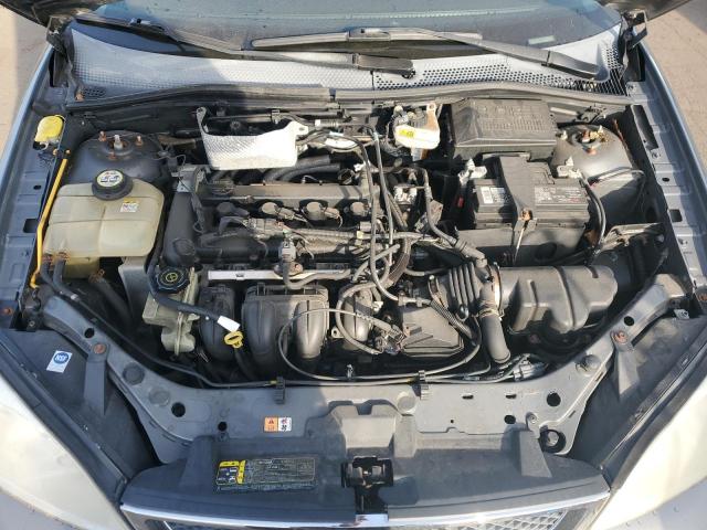 1FAHP34N17W325582 - 2007 FORD FOCUS ZX4 GRAY photo 11