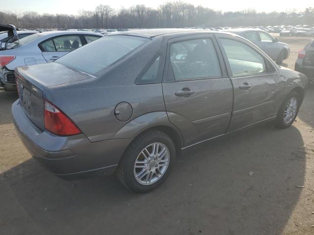 1FAHP34N17W325582 - 2007 FORD FOCUS ZX4 GRAY photo 3