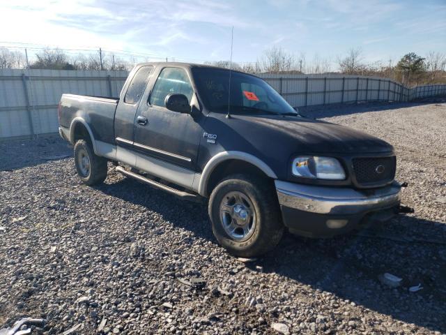 1FTRX18W9YNA48662 - 2000 FORD F150 BLUE photo 4