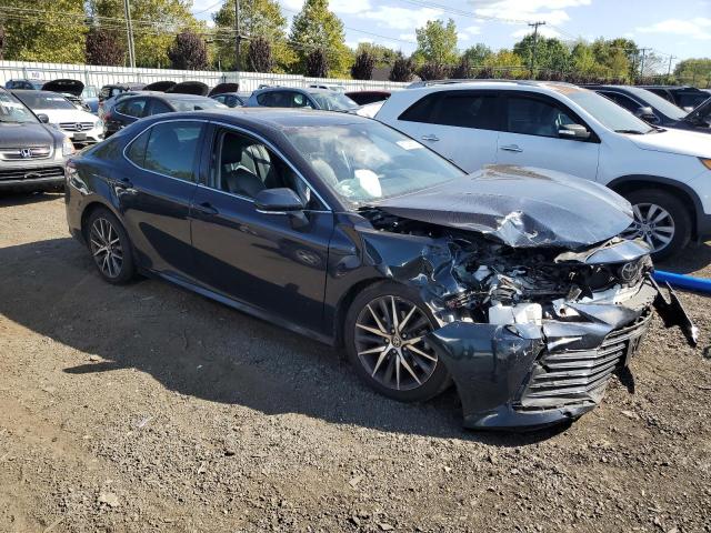 4T1F11BK8MU037982 - 2021 TOYOTA CAMRY XLE BLUE photo 4