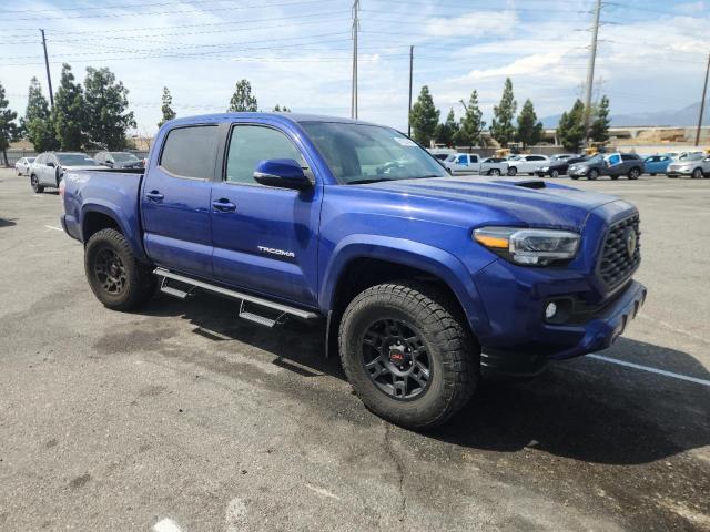 3TMCZ5AN2PM641541 - 2023 TOYOTA TACOMA DOUBLE CAB BLUE photo 4