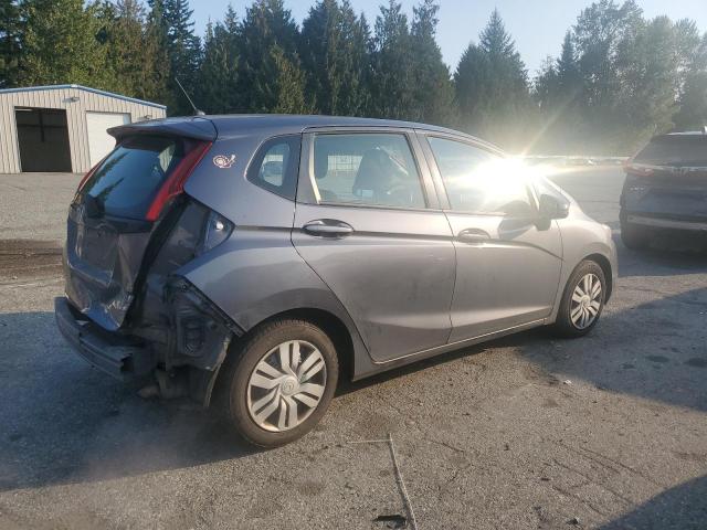 JHMGK5H54GX041169 - 2016 HONDA FIT LX GRAY photo 3