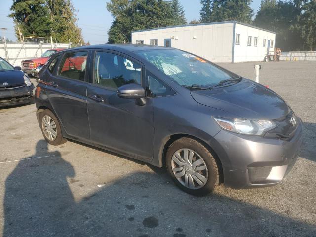 JHMGK5H54GX041169 - 2016 HONDA FIT LX GRAY photo 4