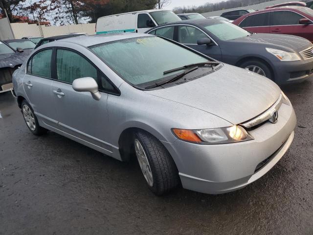 1HGFA16546L082002 - 2006 HONDA CIVIC LX SILVER photo 4