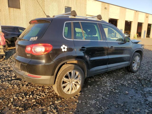 WVGAV7AX2AW515439 - 2010 VOLKSWAGEN TIGUAN S BLACK photo 3