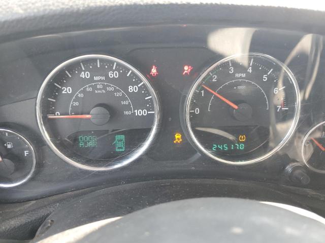 1C4BJWEG9EL262197 - 2014 JEEP WRANGLER U SAHARA GRAY photo 9