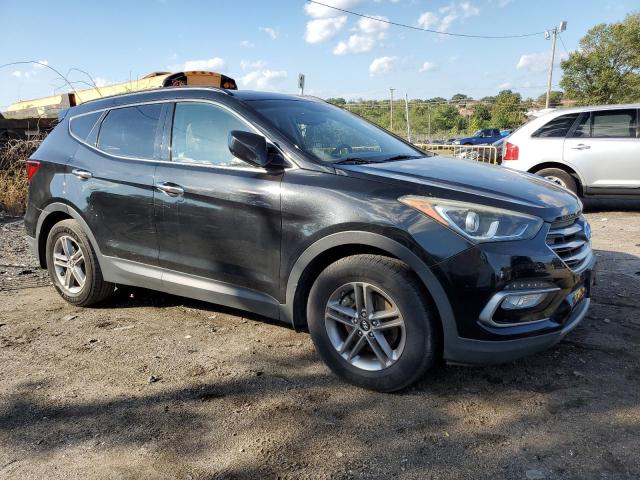 5NMZU3LB5HH018824 - 2017 HYUNDAI SANTA FE S BLACK photo 4